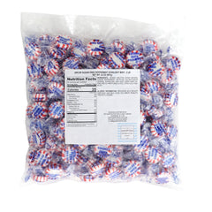 THE HAMPTON CANDY COMPANY close-up of peppermint starlight texture, highlights smooth hard candy surface