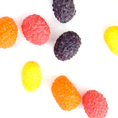 Hand holding Hampton Popcorn Company candy to show size — convenient portioning benefit