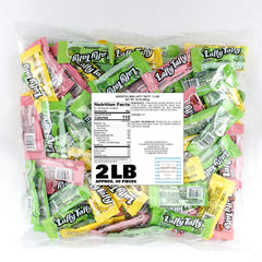 Close-up of an unwrapped Laffy Taffy piece by The Hampton Popcorn Company showing soft texture and color