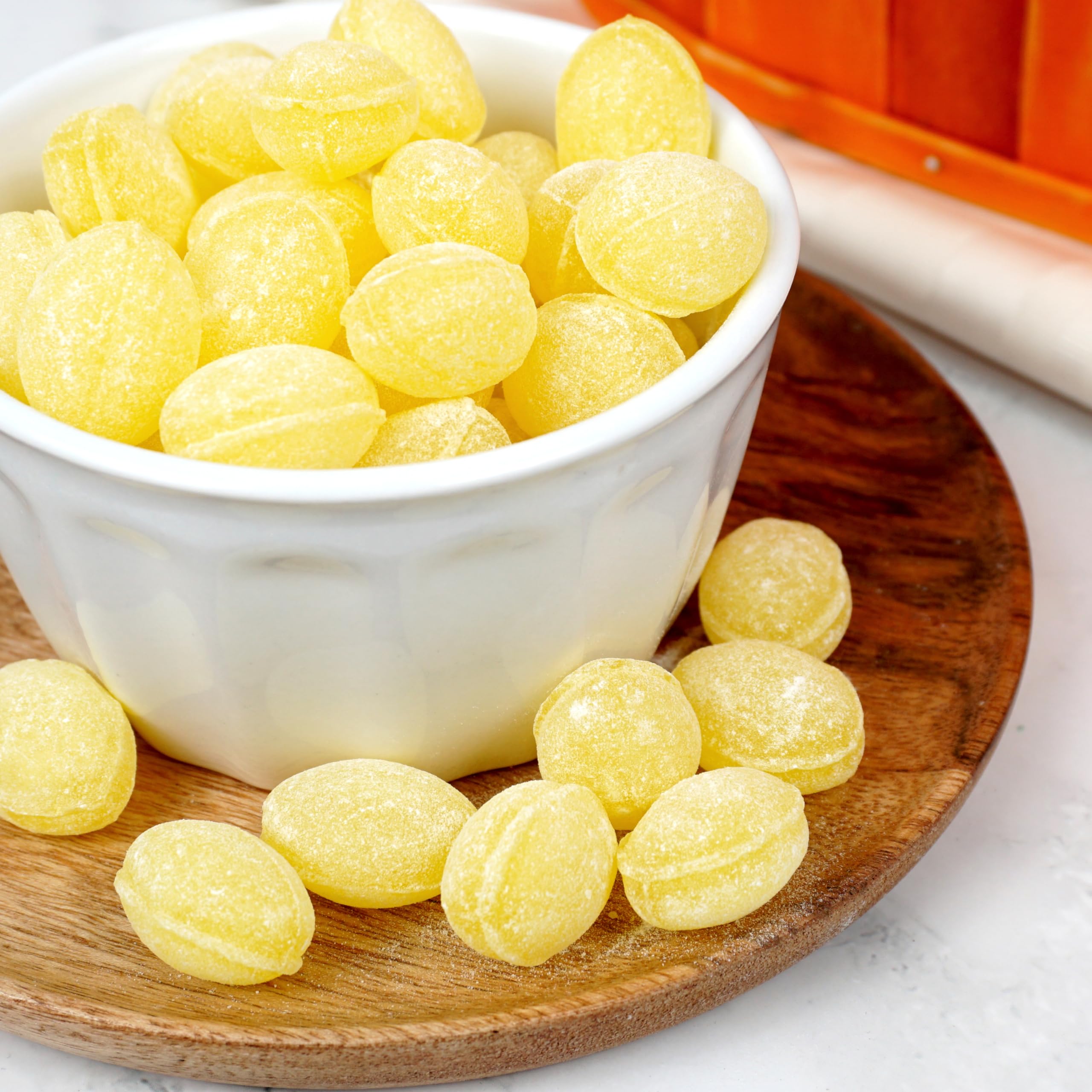 Bulk scoop of Claeys sanded lemon drops by The Hampton Popcorn Company for easy serving