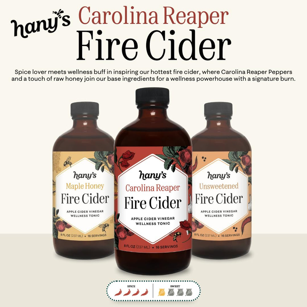 Hany's Fire Cider poured into a cup of tea, demonstrating warming beverage use