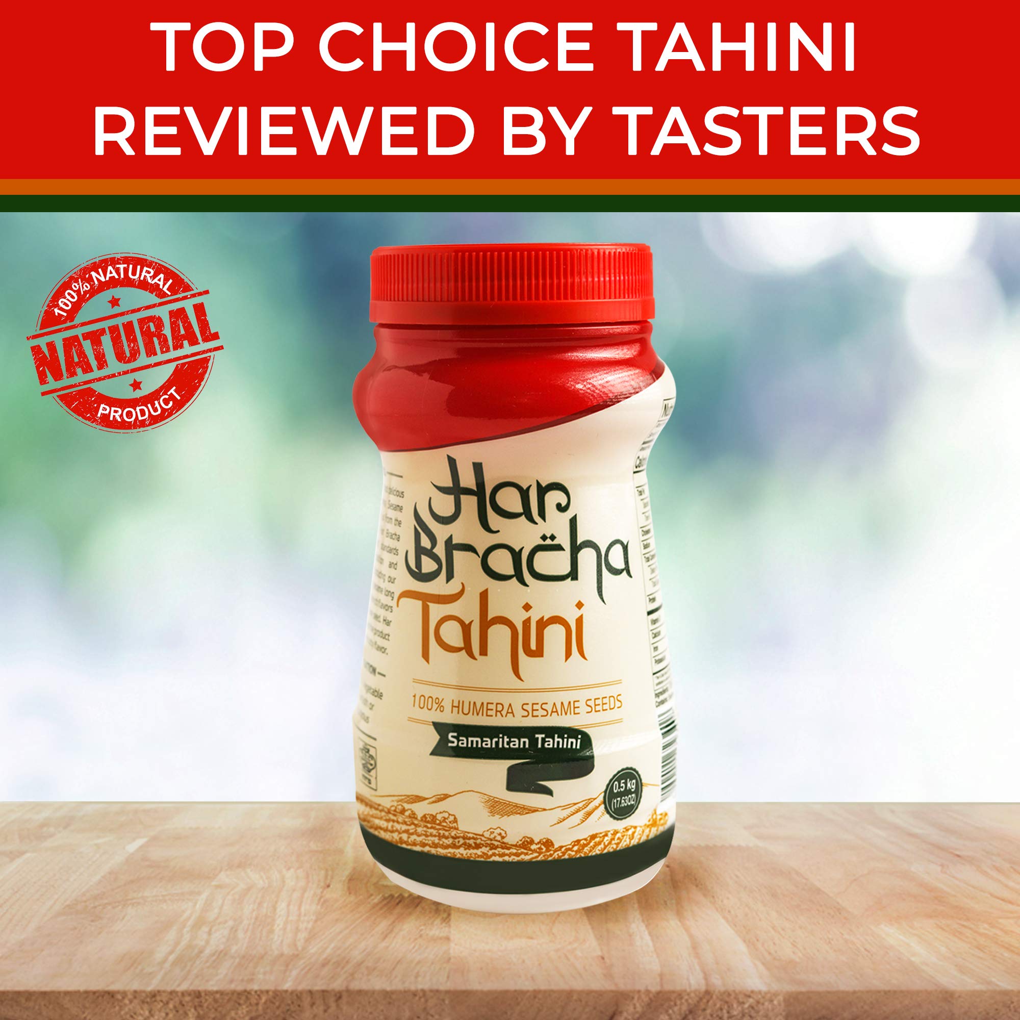 Har Bracha tahini on spoon served with hummus demonstrating rich flavor