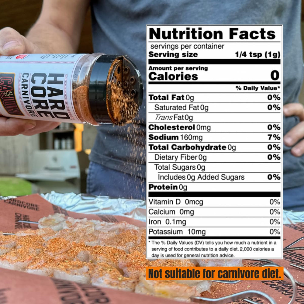 Hardcore Carnivore bottle next to raw spices highlighting natural ingredients and freshness