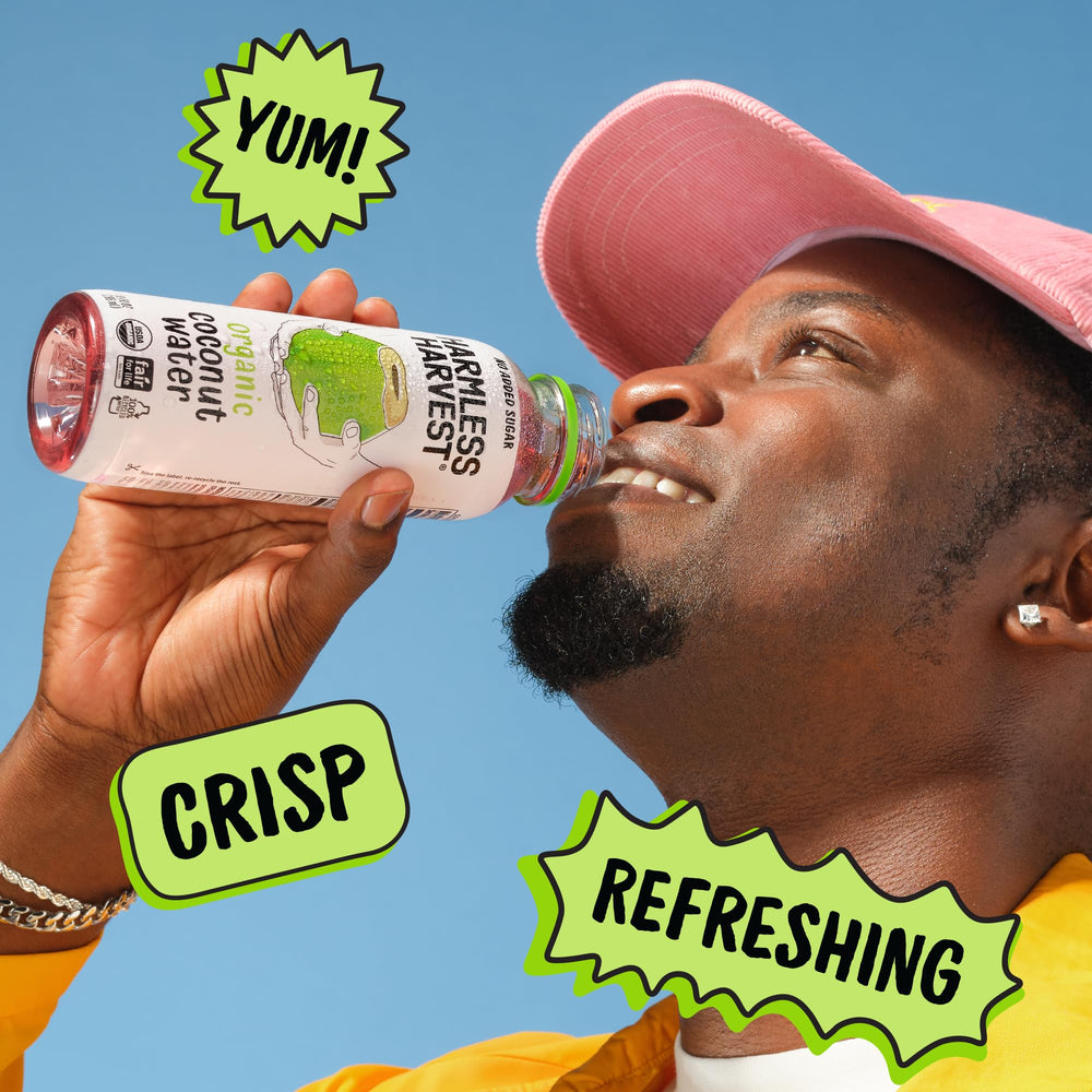 Harmless Harvest bottles stocked in refrigerator illustrating single-serve convenience