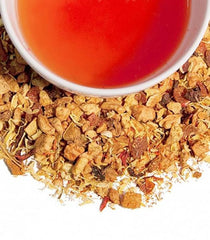 Harney & Sons brewed blood orange tea in cup, vivid orange-red color and aromatic steam, shows rich infusion
