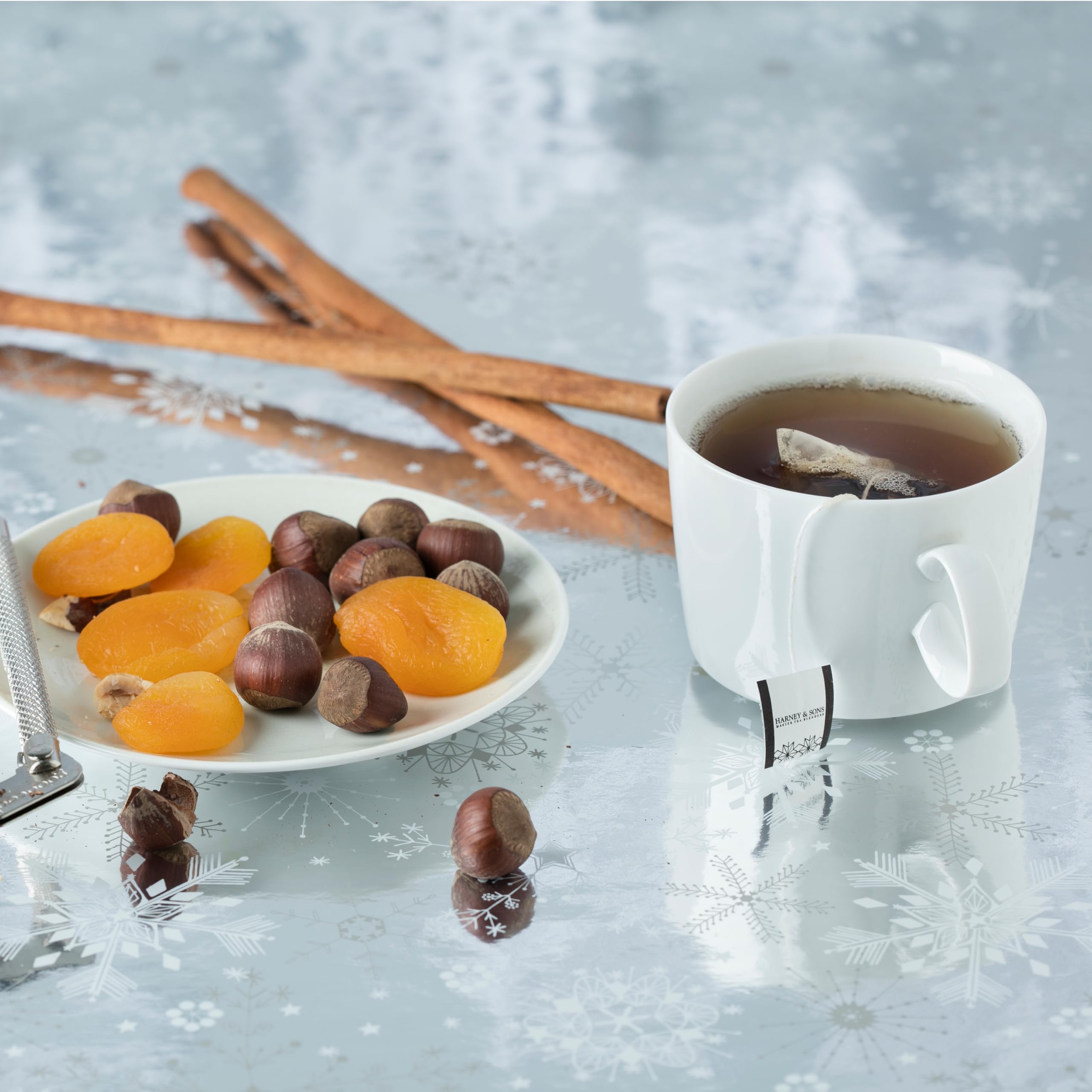 Harney & Sons tin on holiday table conveying festive presentation and reusable storage benefit