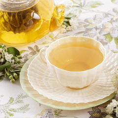 Harney & Sons tea sachet steeping in cup illustrating easy brewing and clear floral cup