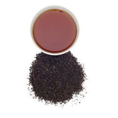 Harney & Sons close-up of Keemun loose leaves, showing whole-leaf texture and freshness