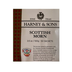 Harney & Sons sachet steeping in cup demonstrating strong amber color and milk pairing