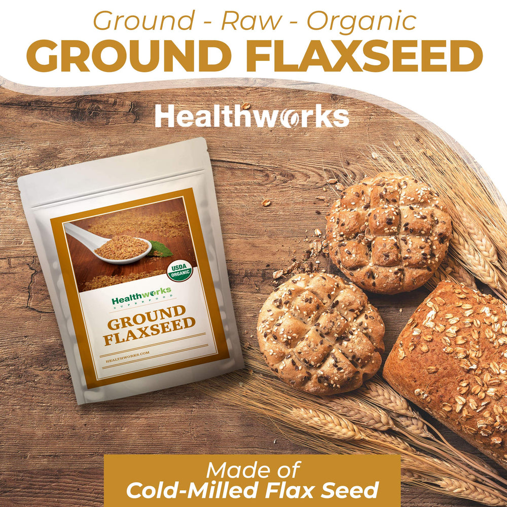 Healthworks Superfoods spoon with a serving of ground flaxseed demonstrating easy portioning for recipes