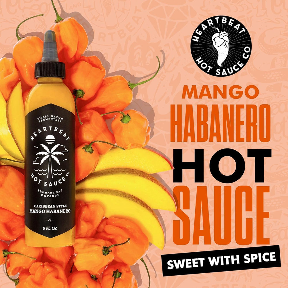 Heartbeat Hot Sauce Co. mango-habanero sauce pouring from tip for controlled drizzle benefit