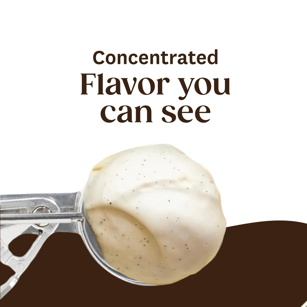Spoon pouring Heilala paste into batter demonstrating rich flavor boost