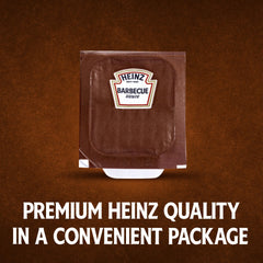 HEINZ open 1 oz cup revealing smooth barbecue sauce for immediate use
