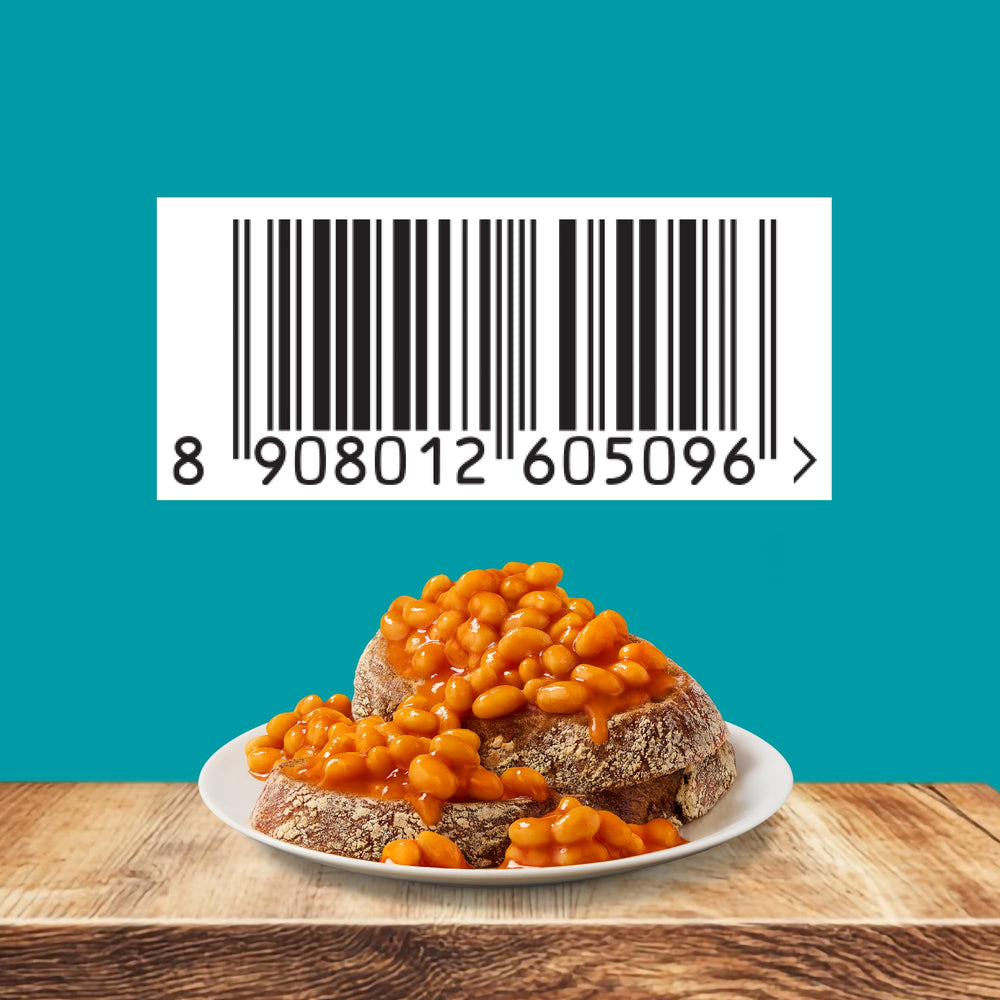 Hand holding a Heinz Beanz 415g tin showing portion size clarity