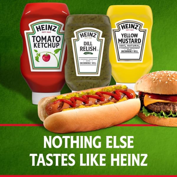 HEINZ bottle held in hand showing 12.7 fl oz scale for portion reference