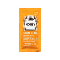 HEINZ honey front packet view showing branding and easy portioning benefit