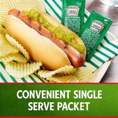 HEINZ packets held in hand illustrating easy portion control benefit