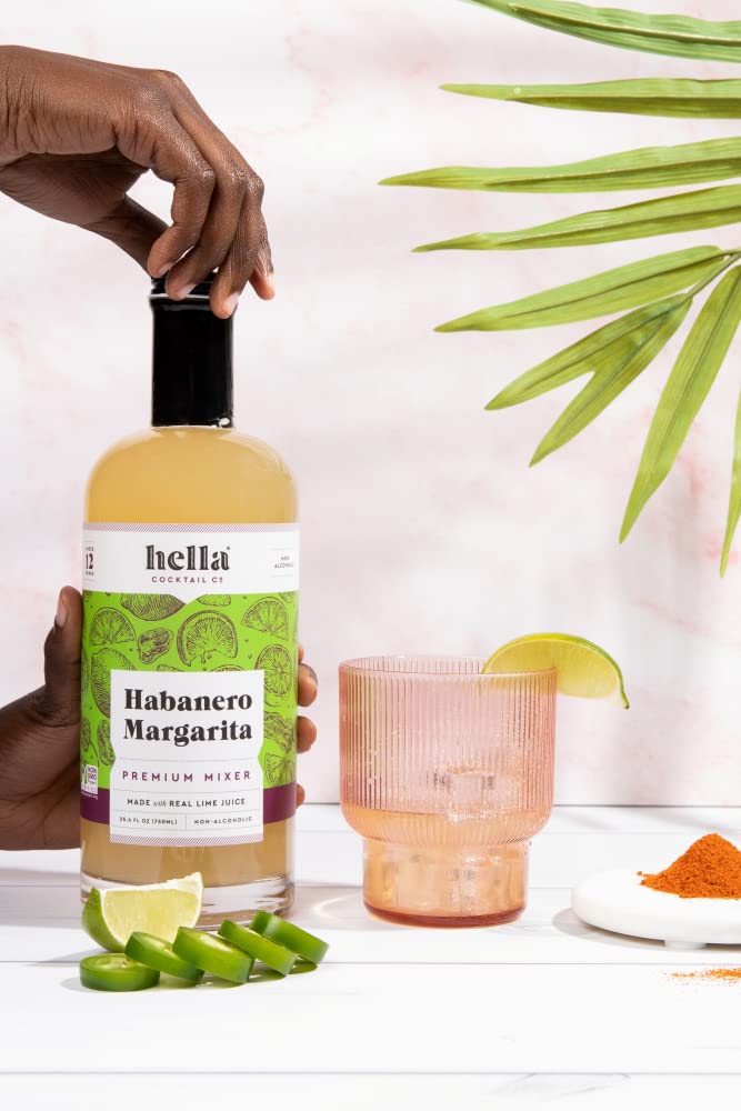 Hella Cocktail Co. bottle grouped with tequila and limes benefit: mixes well with premium spirits