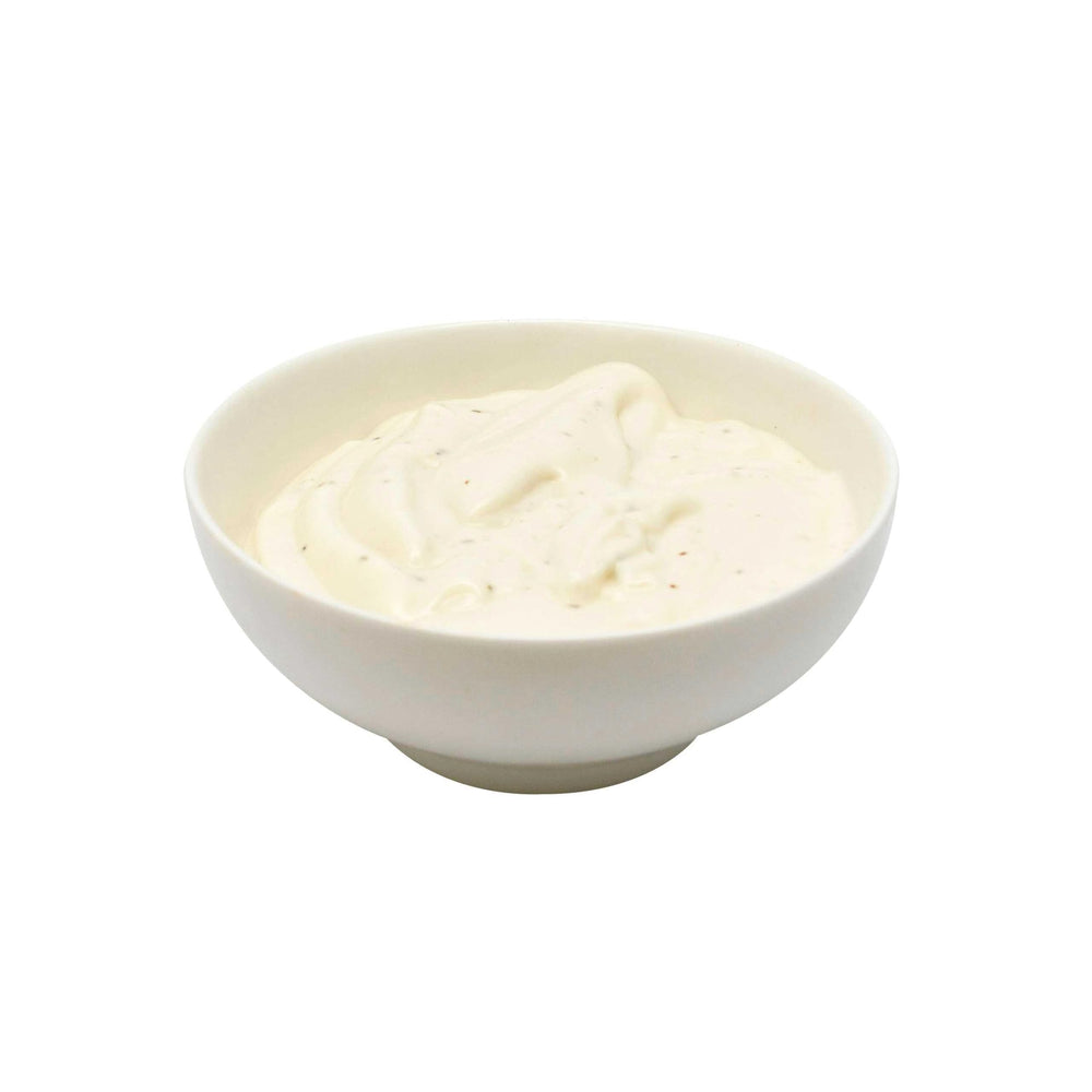 Hellmann's ranch dressing on a leafy salad enhancing visual appeal