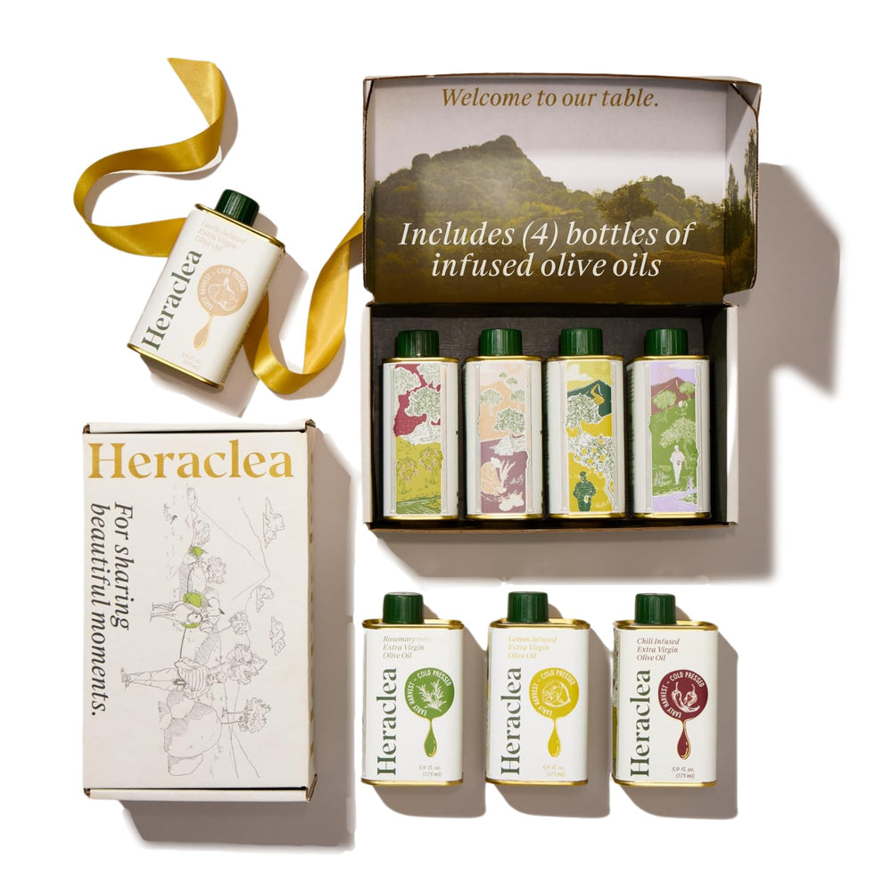 Heraclea gift box front packaging showing four infused olive oil bottles and branding benefit