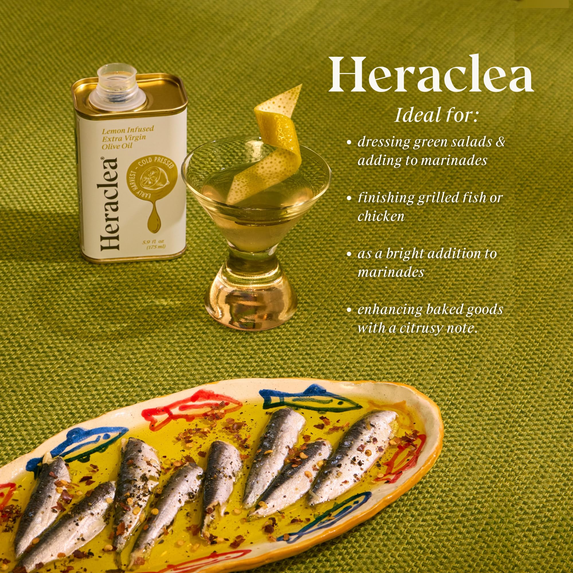 Heraclea drizzling lemon olive oil onto fresh bread to enhance flavor