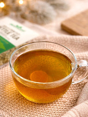 Brewed cup of HerbaZest muña tea, steaming and calming for daily use