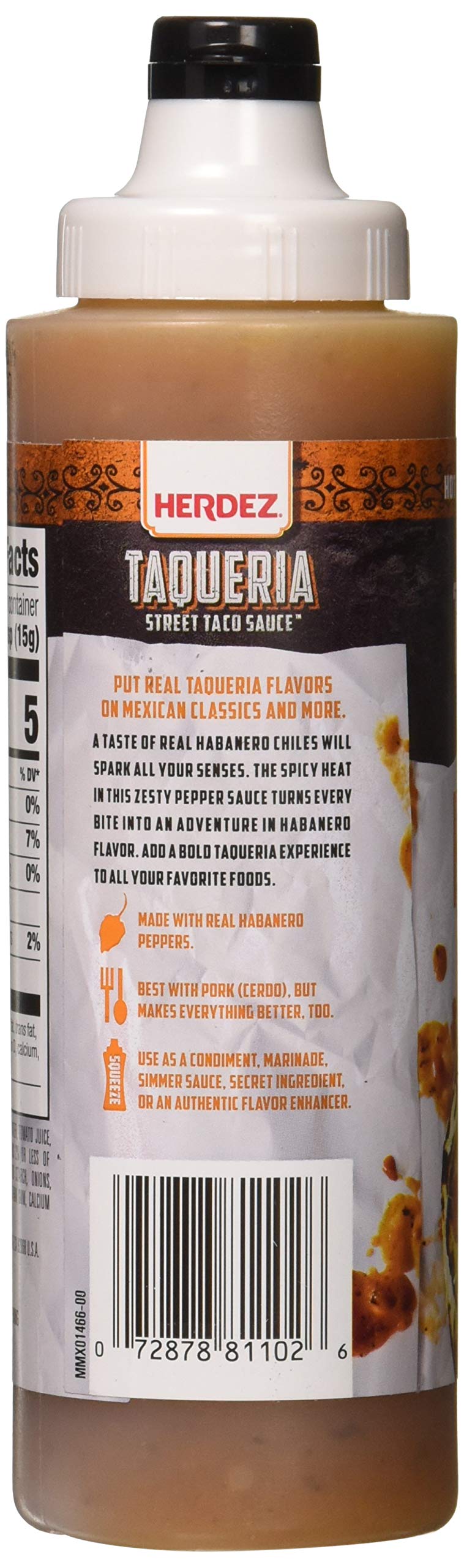Herdez habanero close-up of sauce texture, shows smoky color and pour consistency