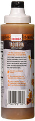 Herdez habanero close-up of sauce texture, shows smoky color and pour consistency