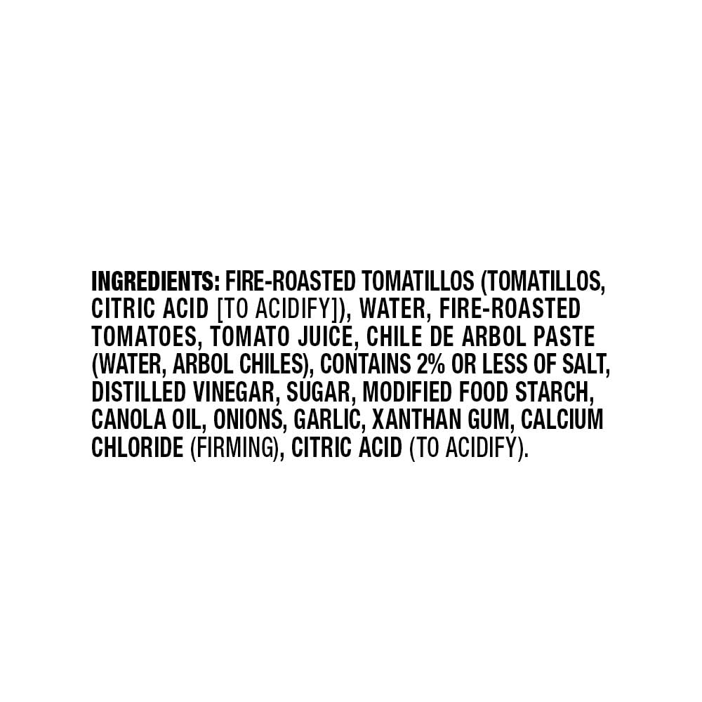 Herdez Roja sauce drizzle on taco illustrating smoky flavor boost and visual appeal