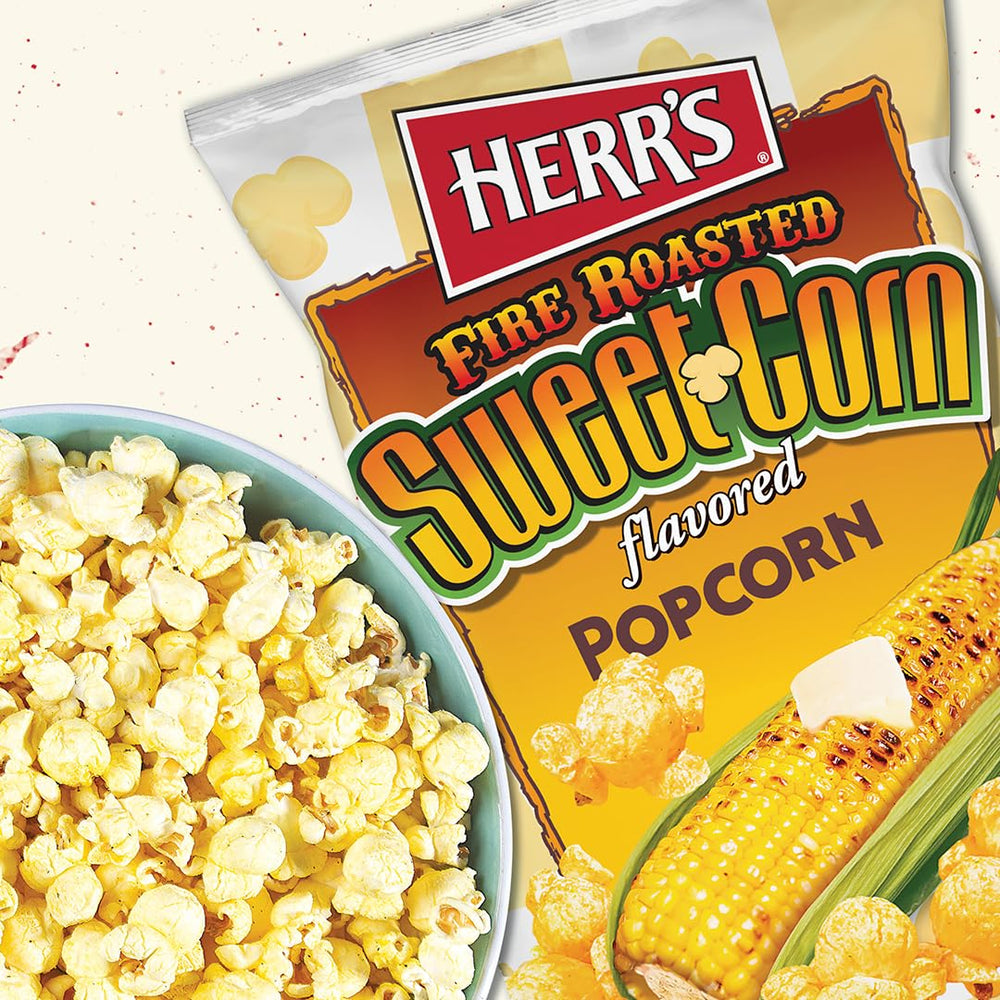 Single crunchy piece of Herr’s popcorn on a fork showing crisp bite
