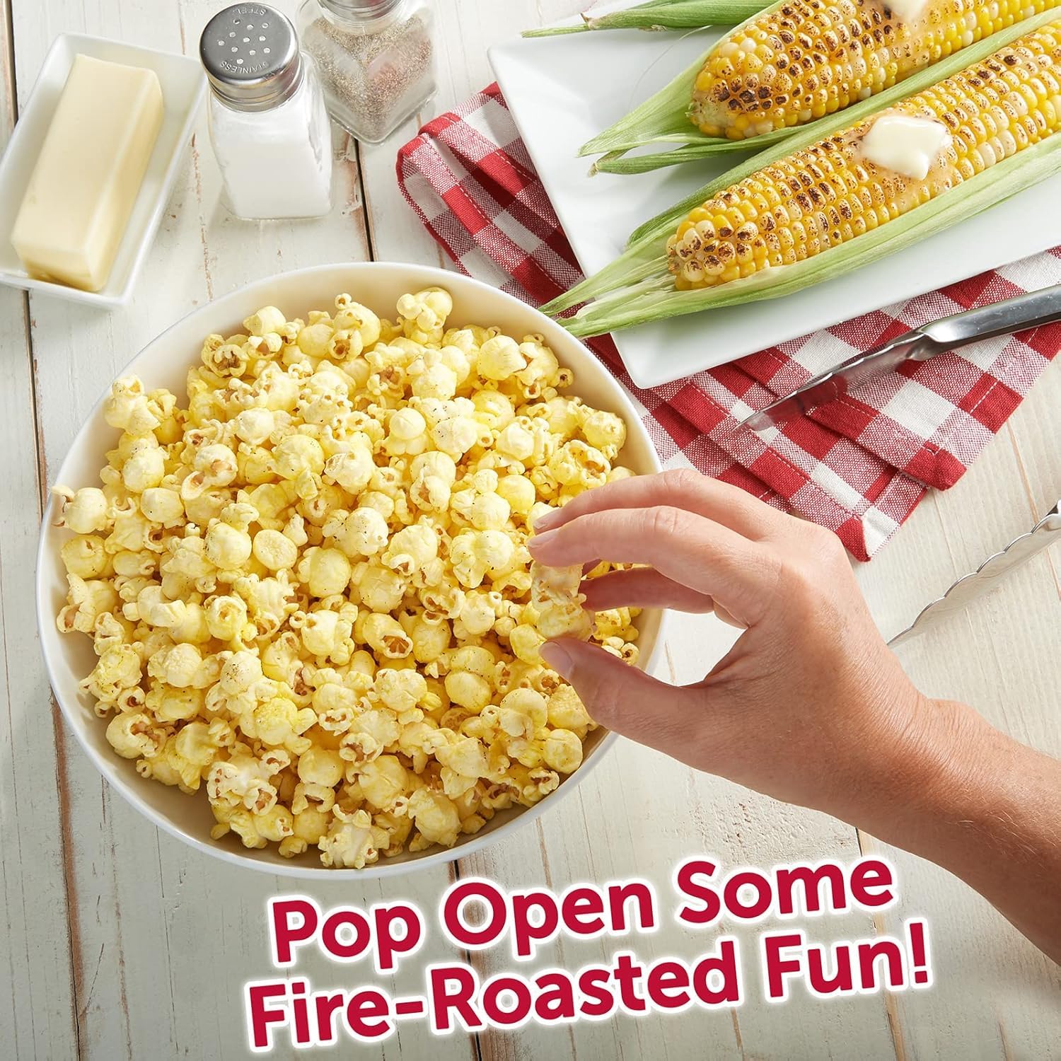 Open Herr’s single-serve bag revealing fresh popcorn to grab and eat