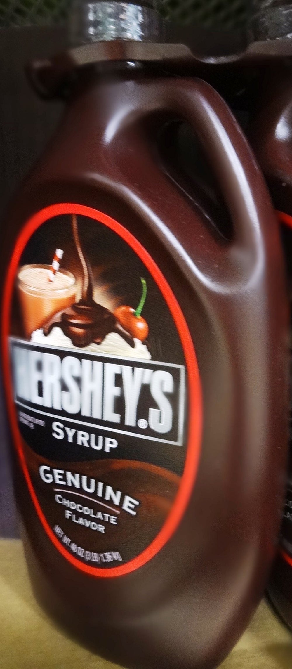 Hershey bottle front view showing label and easy-pour use