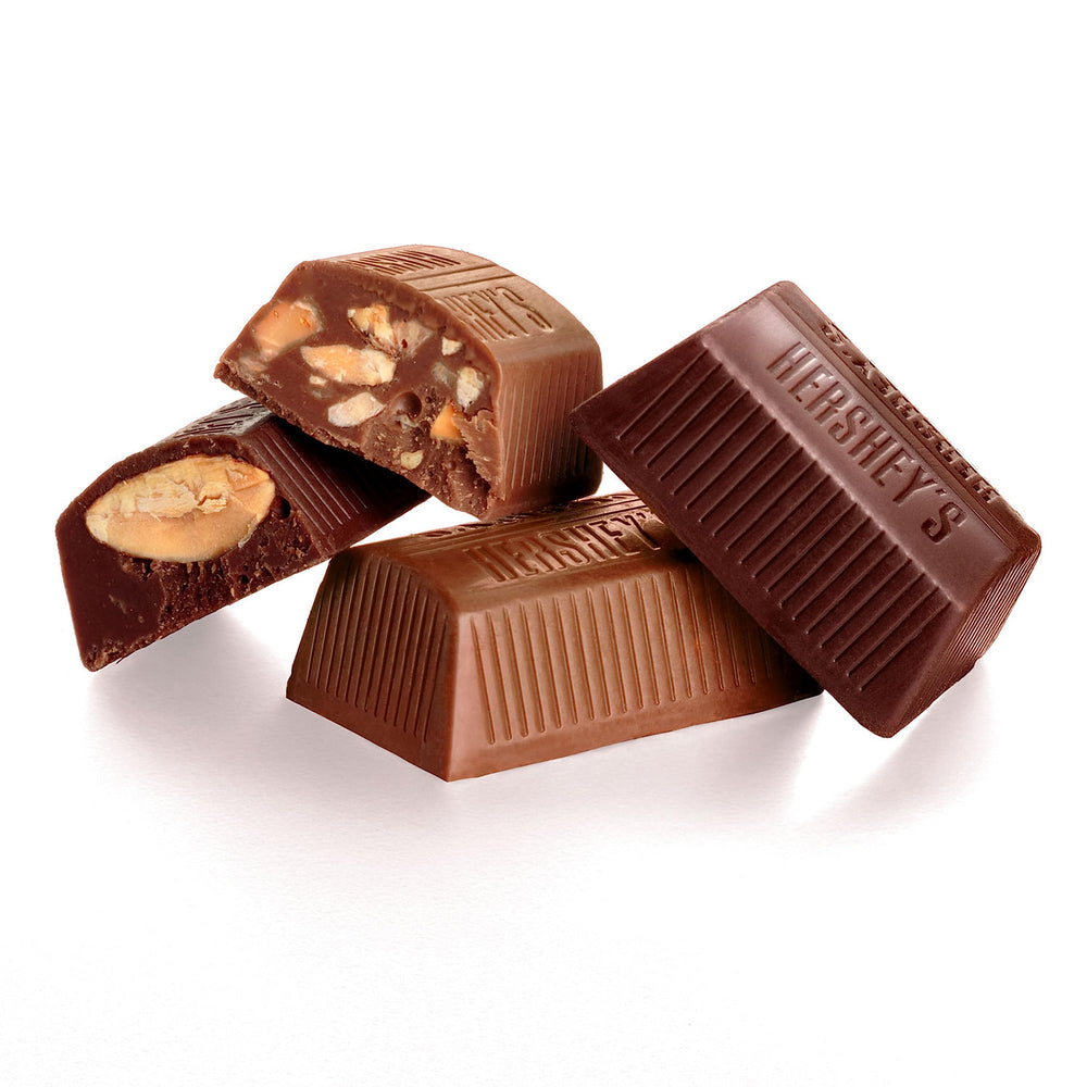 HERSHEY'S NUGGETS arranged on a party table with decorations, festive presentation