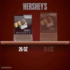 HERSHEY'S NUGGETS unwrapped piece showing chocolate and almond texture, crunchy satisfaction