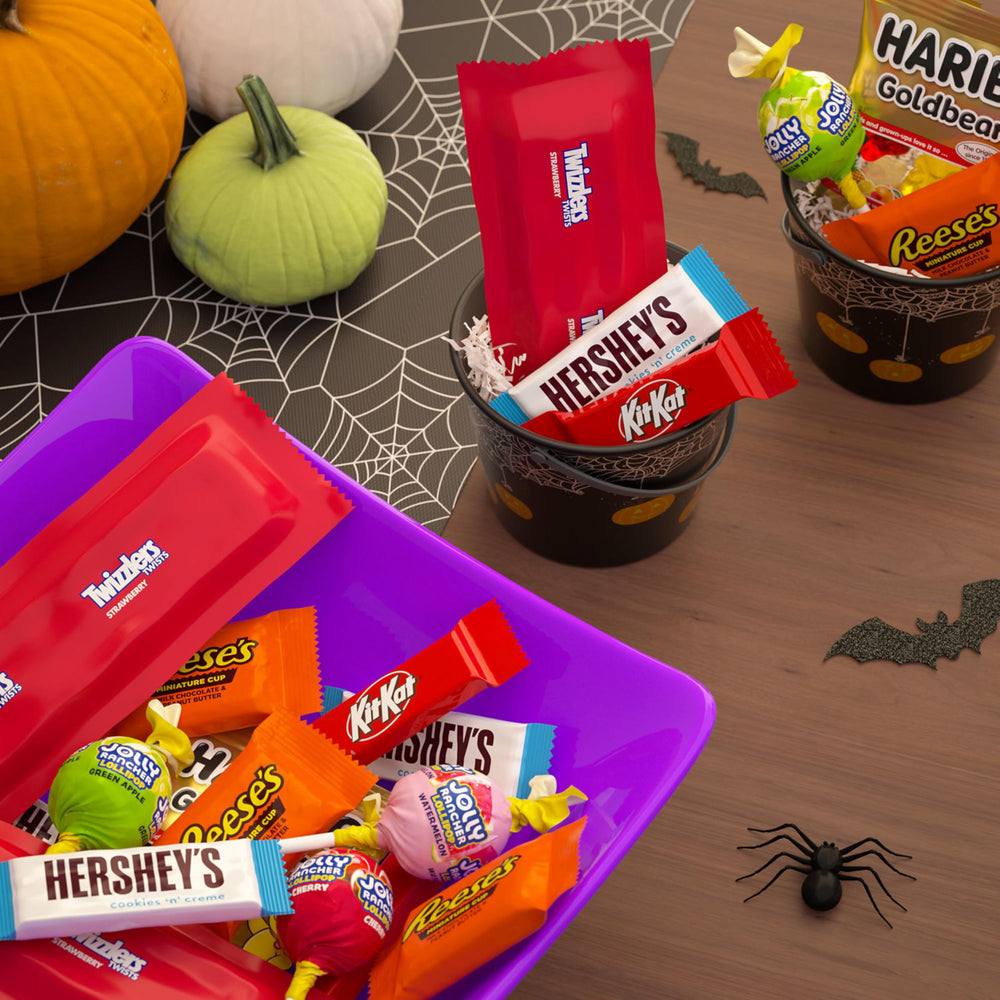 HERSHEY'S bag next to measuring tape illustrating the 98.54-ounce bulk size advantage