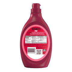 HERSHEY'S syrup being poured over ice cream adding strawberry flavor and shine