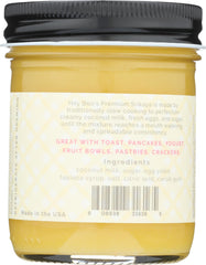 Hey Boo jam on spoon highlighting creamy texture and easy spreadability
