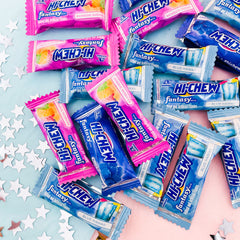Lifestyle shot of HI-CHEW being shared from a pouch showing convenience and gift-ready appeal