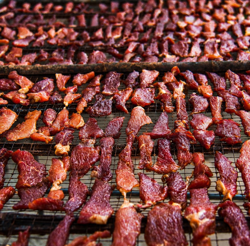 Hi Mountain sliced jerky on wood board highlighting savory jalapeño taste