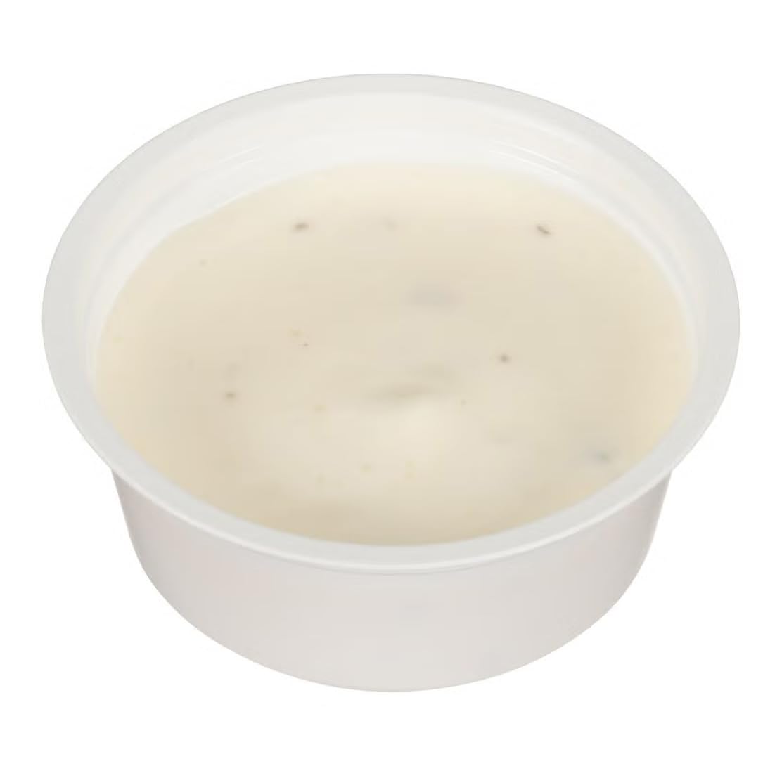 Hidden Valley cup beside salad showing quick serving and portable convenience