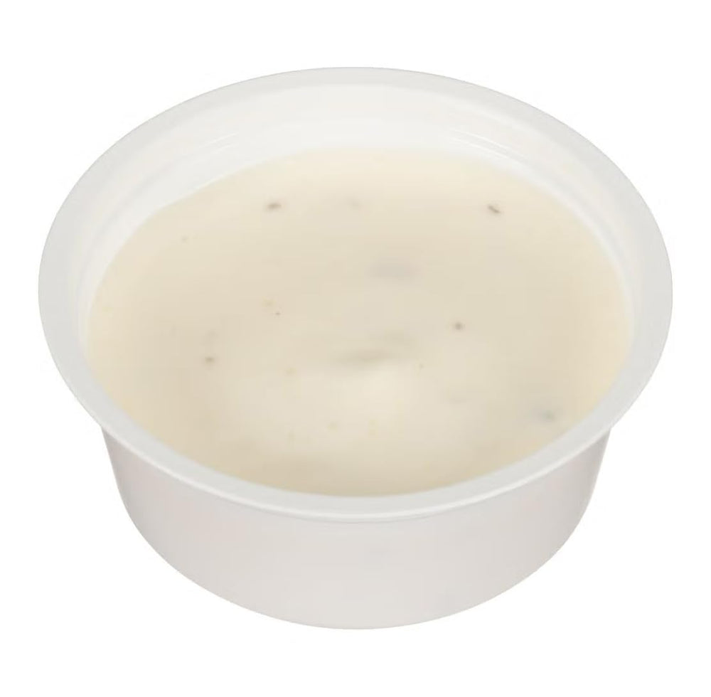 Hidden Valley cup beside salad showing quick serving and portable convenience