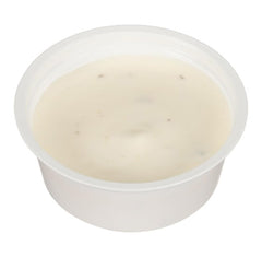Hidden Valley cup beside salad showing quick serving and portable convenience