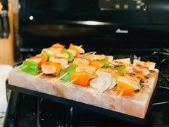 Himalite slab searing steak to create even crust and enhanced flavor benefit