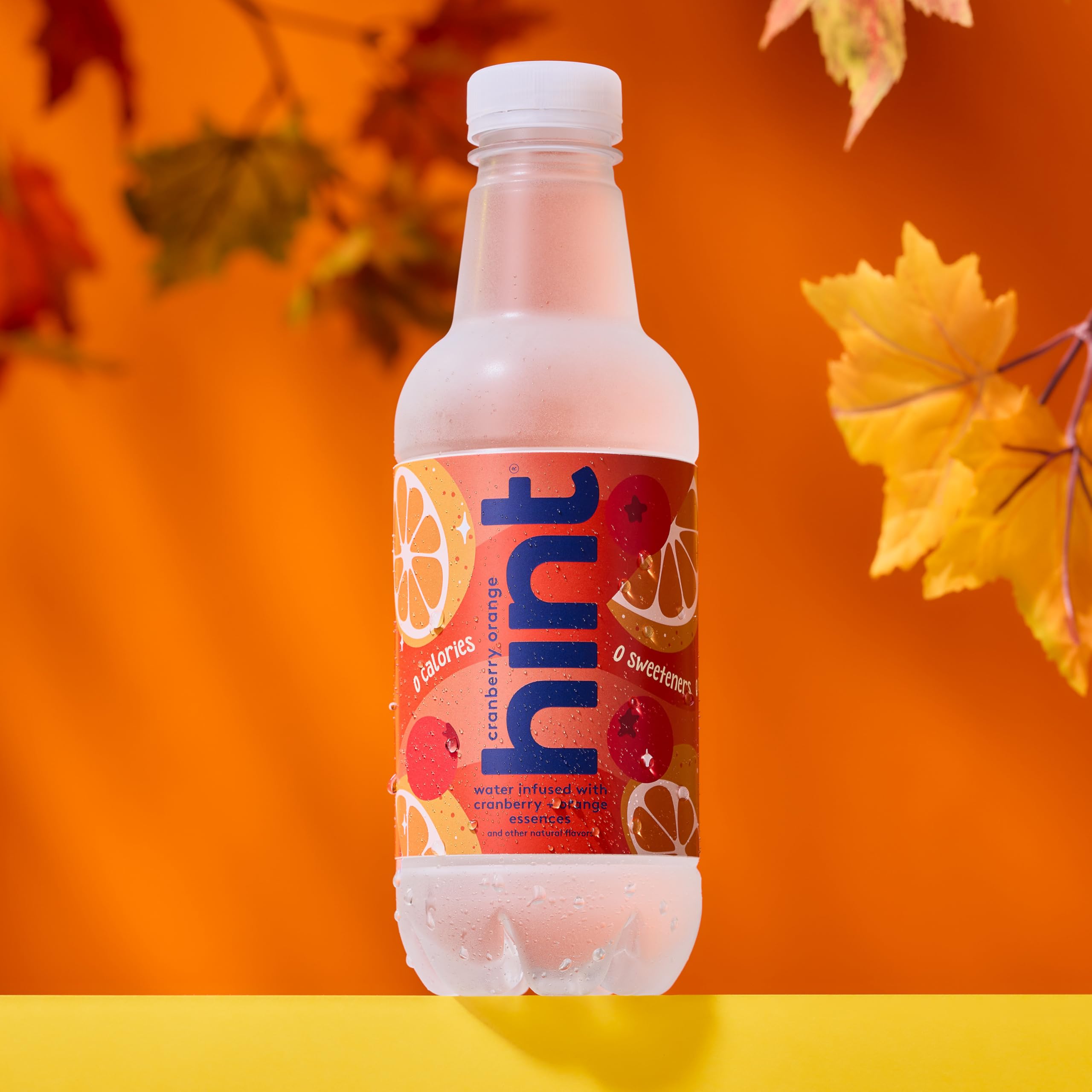 Hint cranberry orange open bottle pouring into glass for immediate refreshment