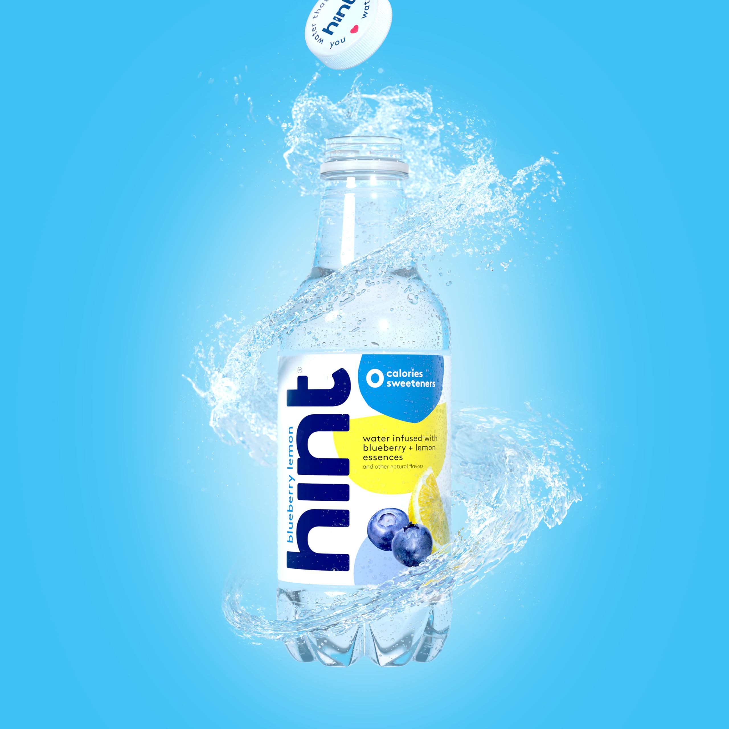 Hint bottle in outdoor setting showing portable hydration on-the-go benefit