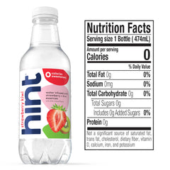 Hand holding Hint strawberry kiwi bottle to show size and easy portable hydration benefit