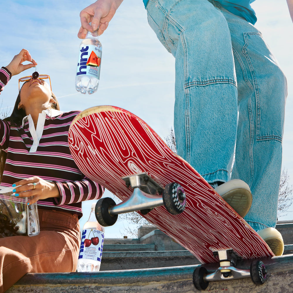 Hint fruit essences with strawberry and watermelon visuals suggesting natural flavor