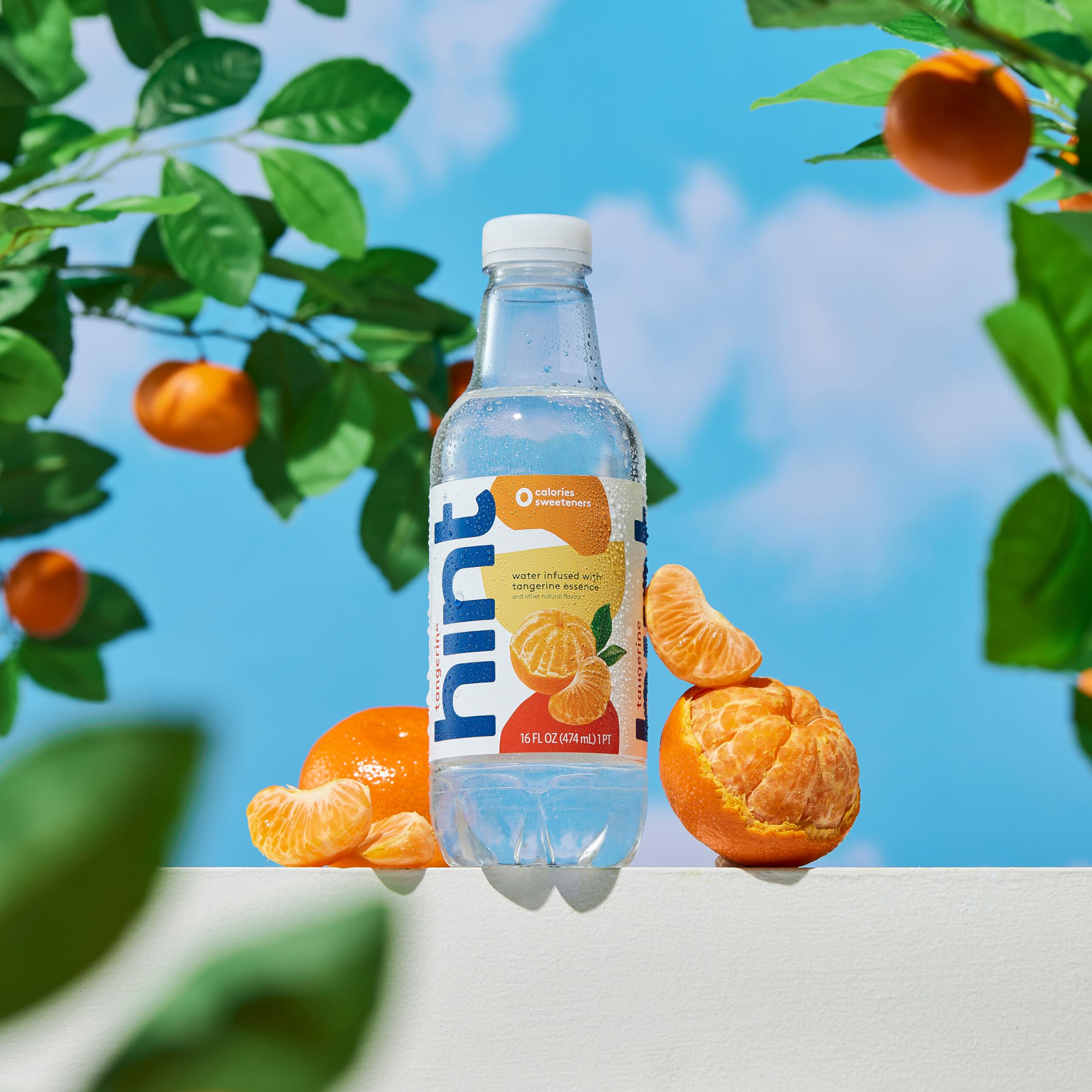 Stacked 12-pack of Hint tangerine bottles illustrating easy stocking benefit