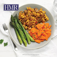 HMR opened bowl of beef stroganoff with wide egg noodles ready to eat
