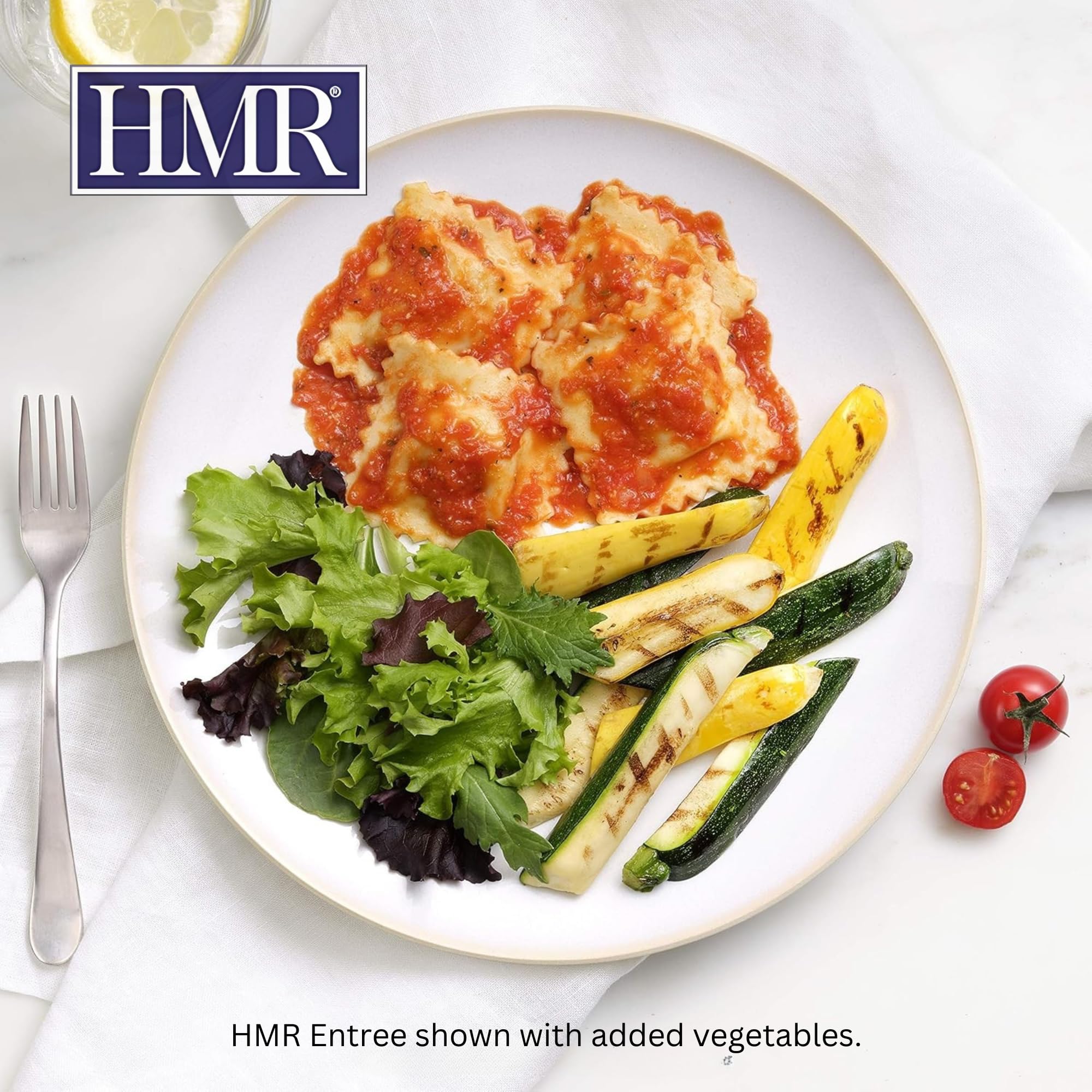 HMR open tray with ravioli and tomato sauce, highlights ready-to-eat convenience